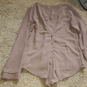 Beautiful long sleeve blouse with detailed back
